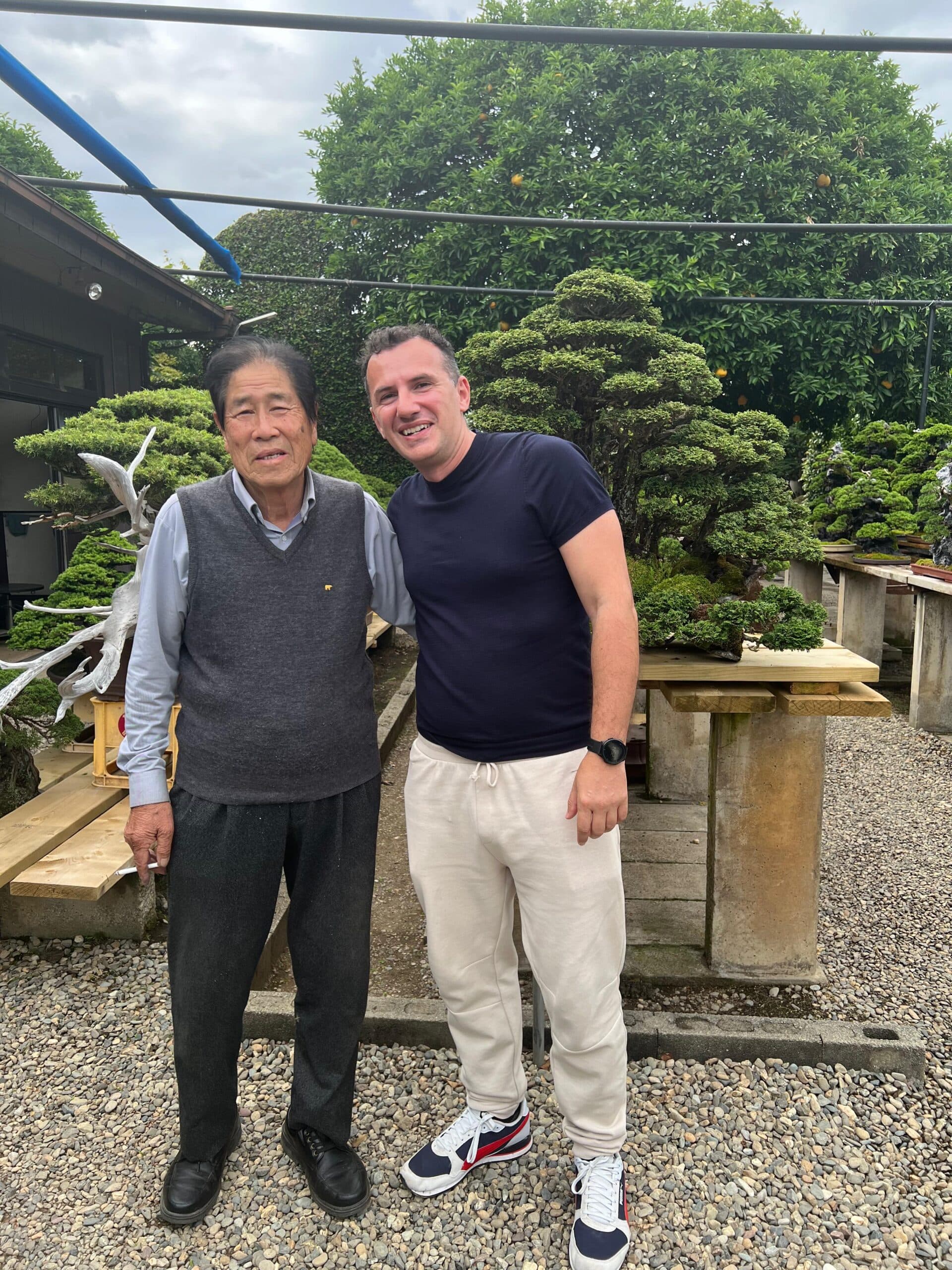 Roberto Liccardo with a bonsai master in Japan